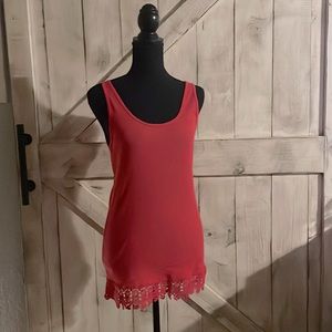 Red tank top with embroidery pattern edge